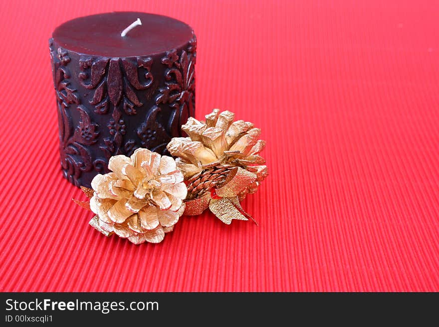 Candle and Pine Cones