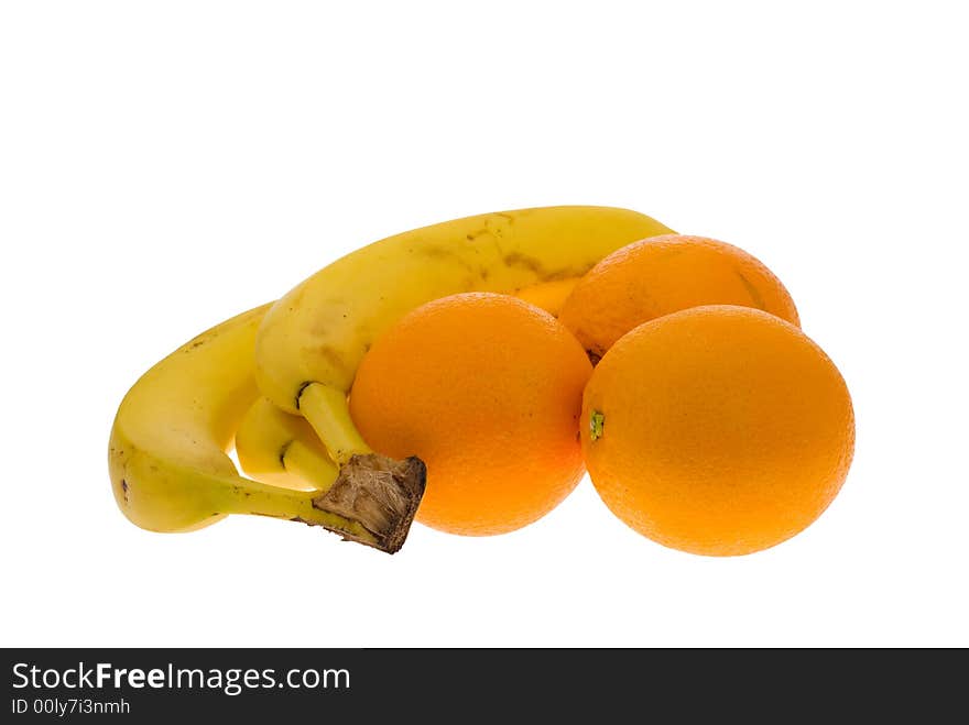 Fresh oranges and banana isolated on a white background