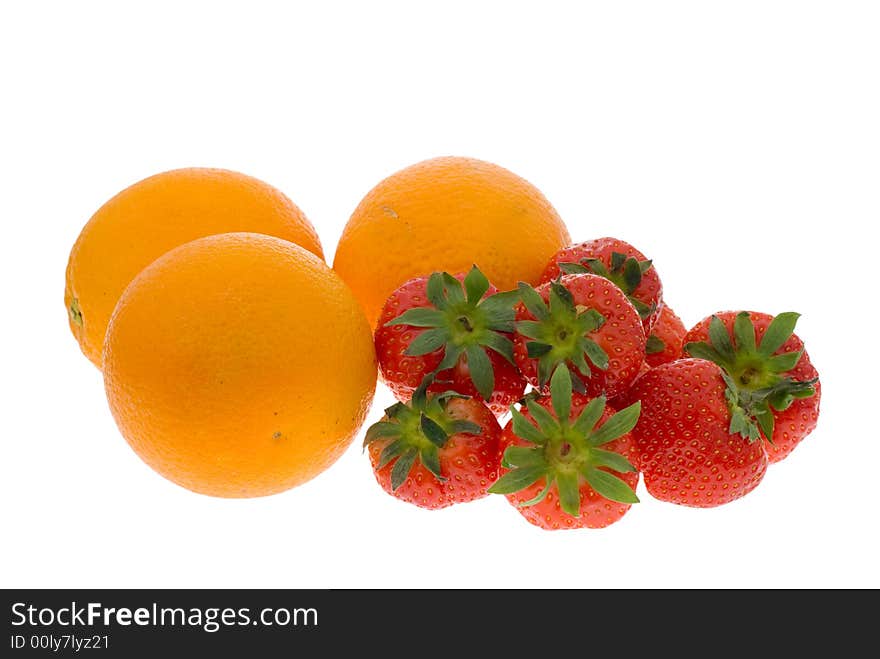 Fresh oranges and strawberries isolated on a white background