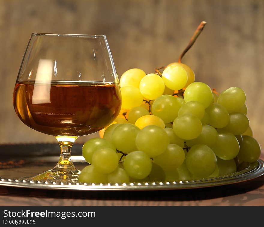 Grape juice on a brown background