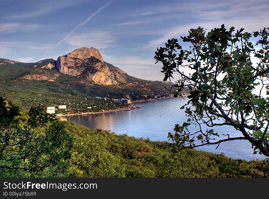 Black sea Crimea Laspi sunset sky sea clouds mountans tree gulf bay. Black sea Crimea Laspi sunset sky sea clouds mountans tree gulf bay