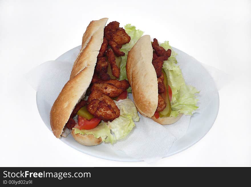 Delicious chicken sandwich ready to serve on white plate