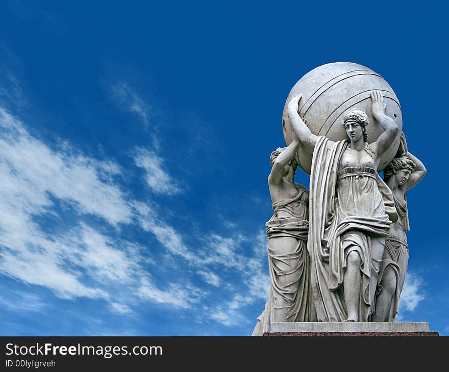 Allegorical statues about admiralty on a sky  background. St.Petersburg , Russia