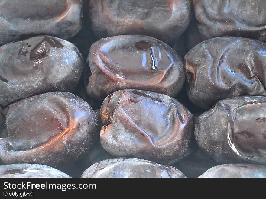 Close up of black dates from persian golf