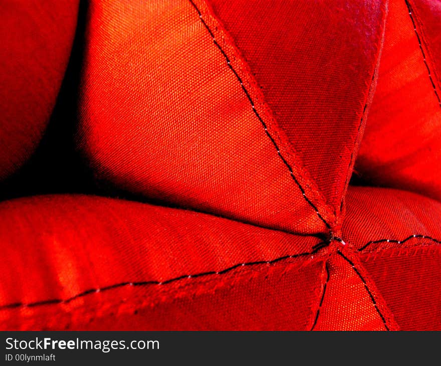 Photo taken of an Indian silk cushion. Photo taken of an Indian silk cushion.