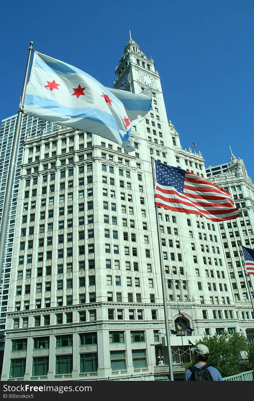 An American flag on the Michigan Ave. bridge with the famous Wrigley building in the background. An American flag on the Michigan Ave. bridge with the famous Wrigley building in the background.