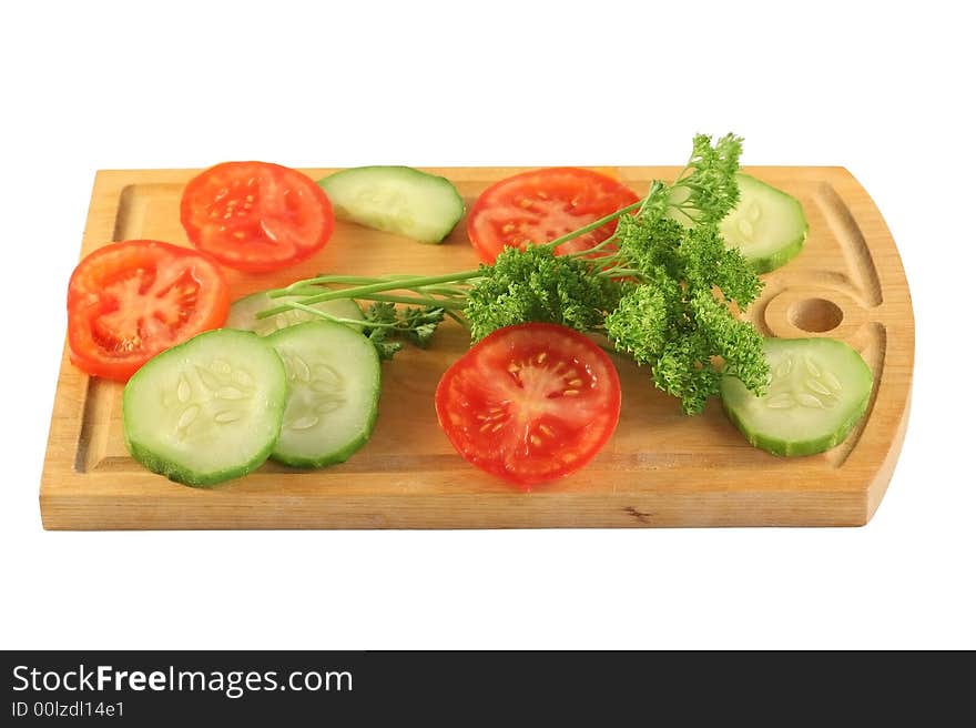 Vegetebles on a board .