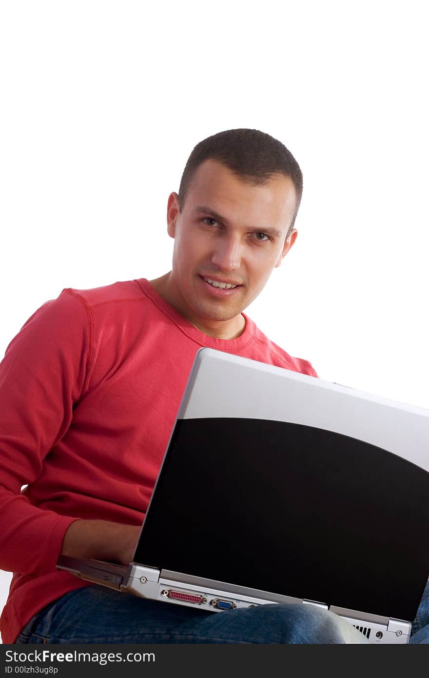 Young man working on laptop isolated on white background