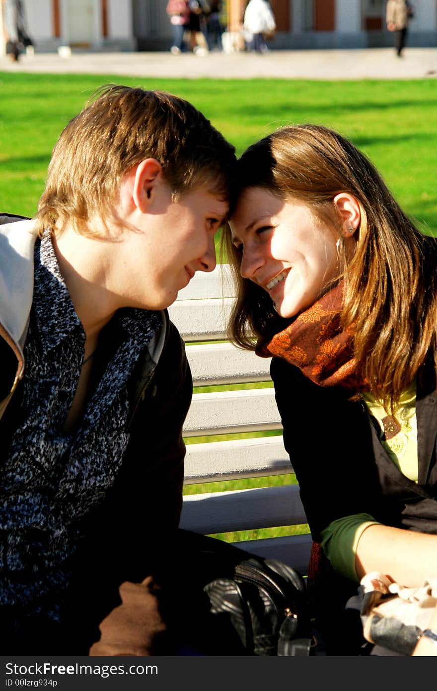 They are sitting on the bench and dreaming about something. They are sitting on the bench and dreaming about something