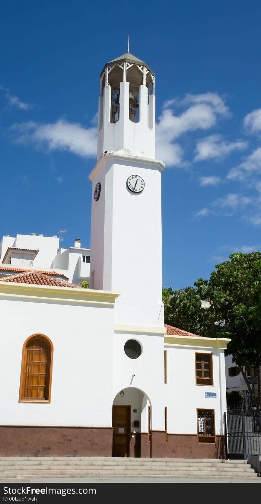 White painted church tower in Spain