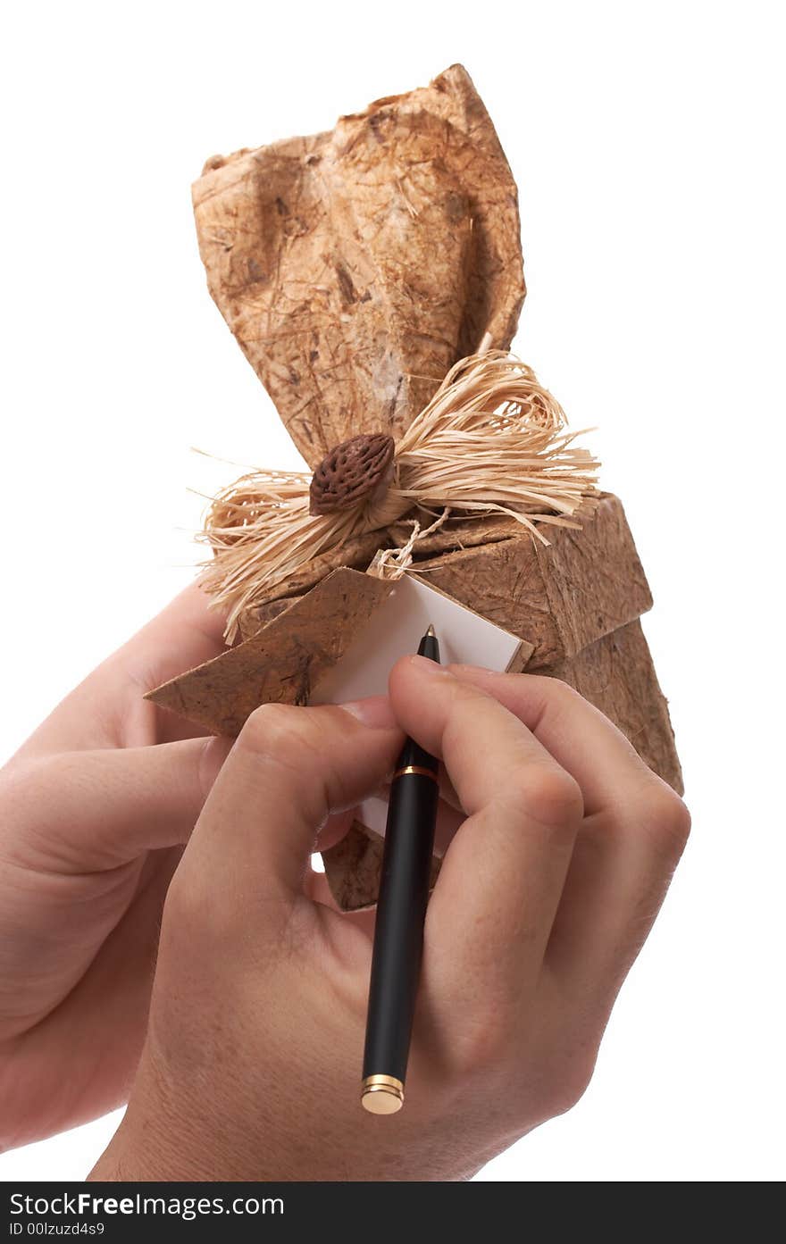 A brown gift box over a white background