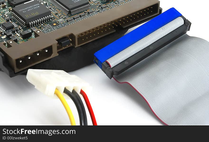 A fragment of a hard disk of a computer, with communication and feeding with cables. A fragment of a hard disk of a computer, with communication and feeding with cables.