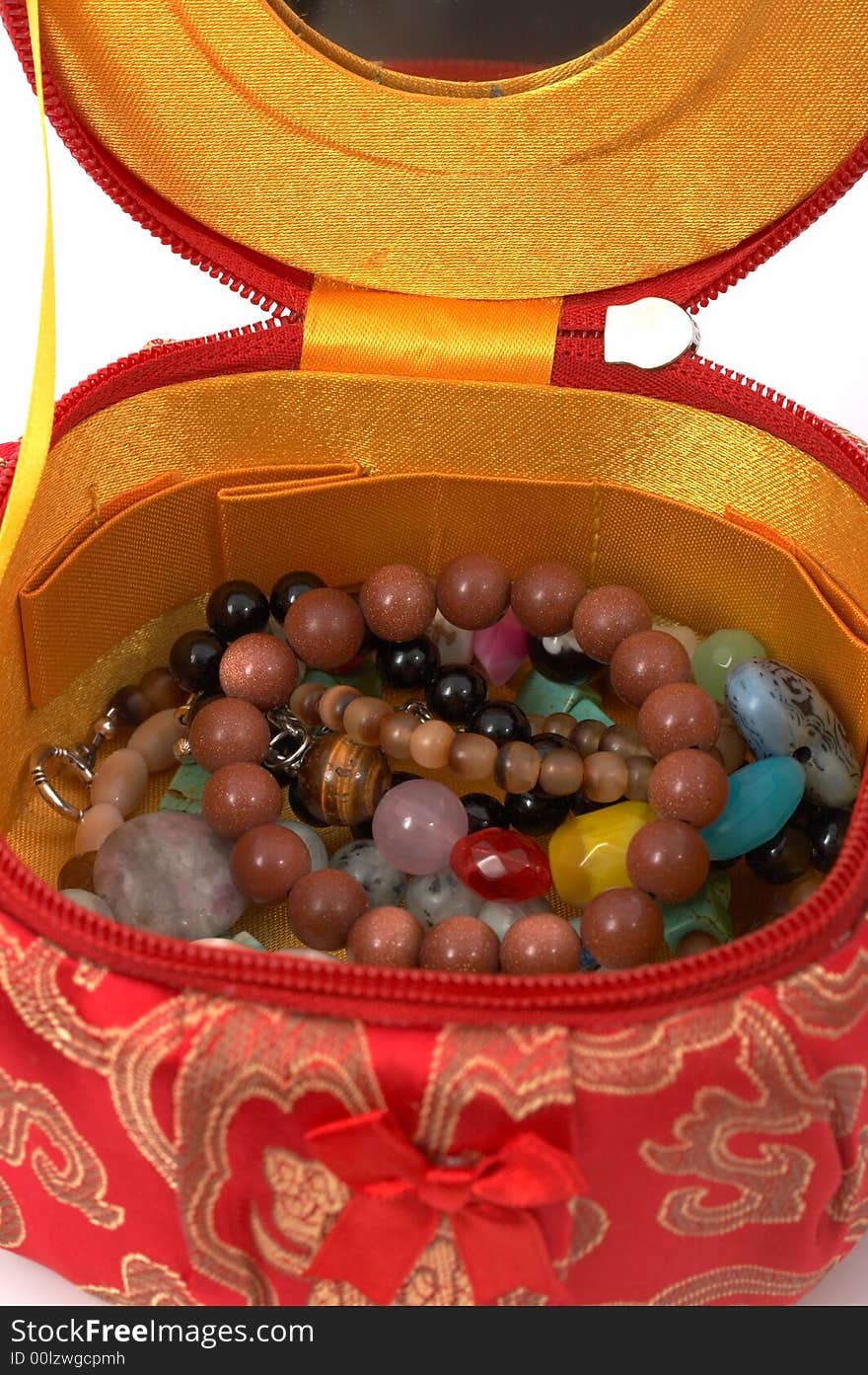 Assorted bead jewelry on a jewelry container. Assorted bead jewelry on a jewelry container