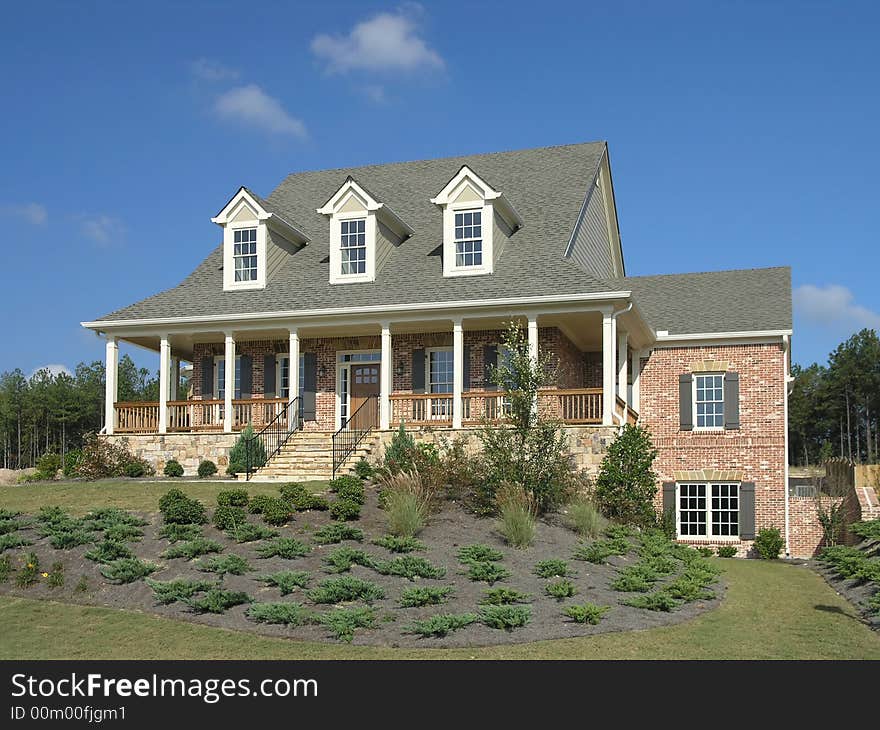 Luxury Home Exterior against blue sky. Luxury Home Exterior against blue sky