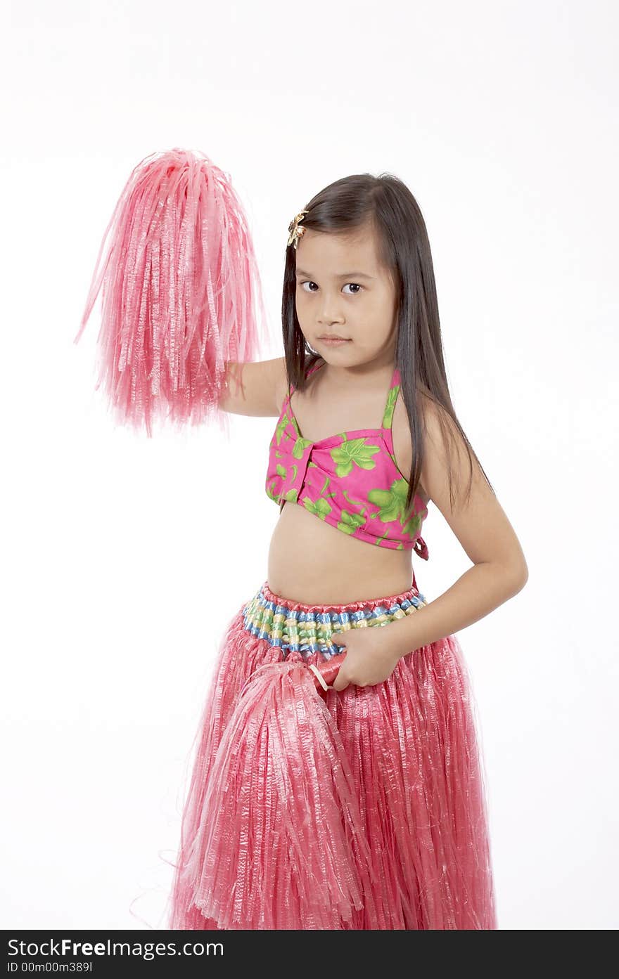 A girl wearing a hawaiian costume over a white background