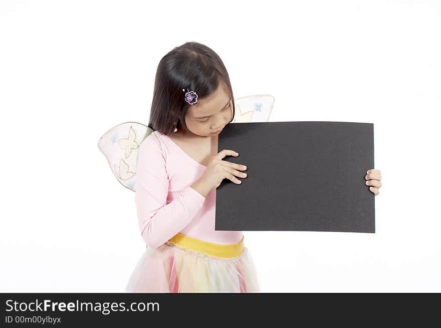 A girl holding a blank placard over a white background. A girl holding a blank placard over a white background