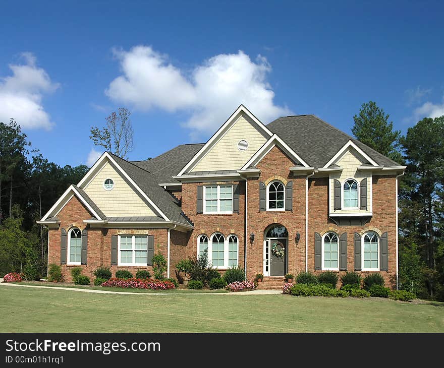 Luxury Home Exterior against blue sky. Luxury Home Exterior against blue sky