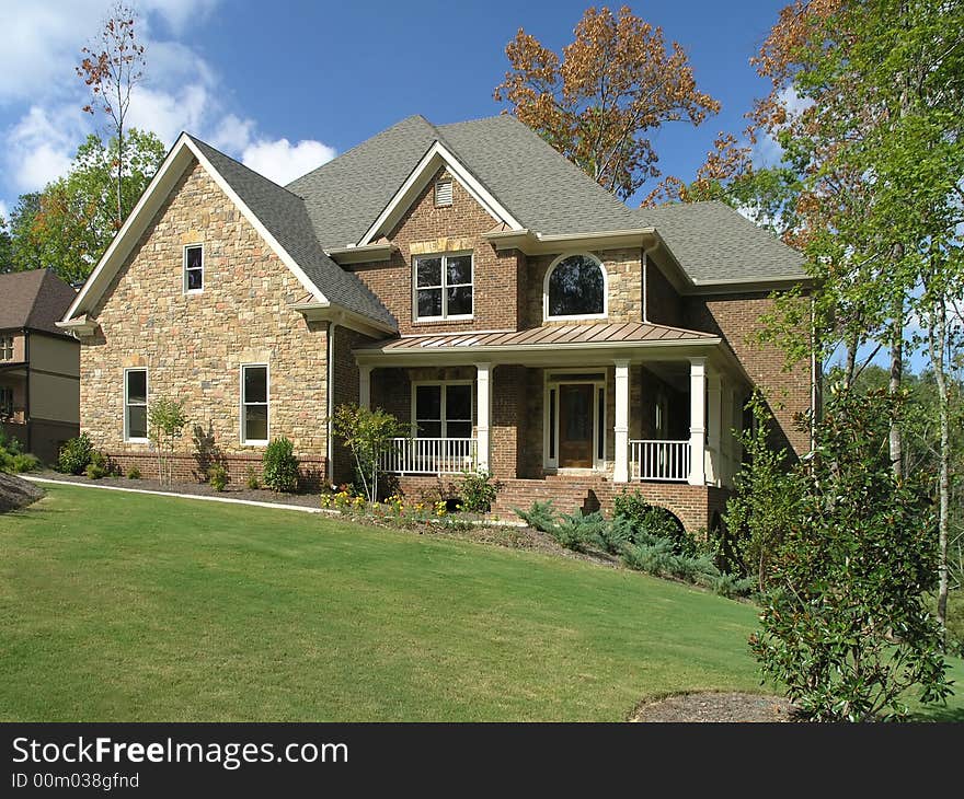 Luxury Home Exterior against blue sky. Luxury Home Exterior against blue sky