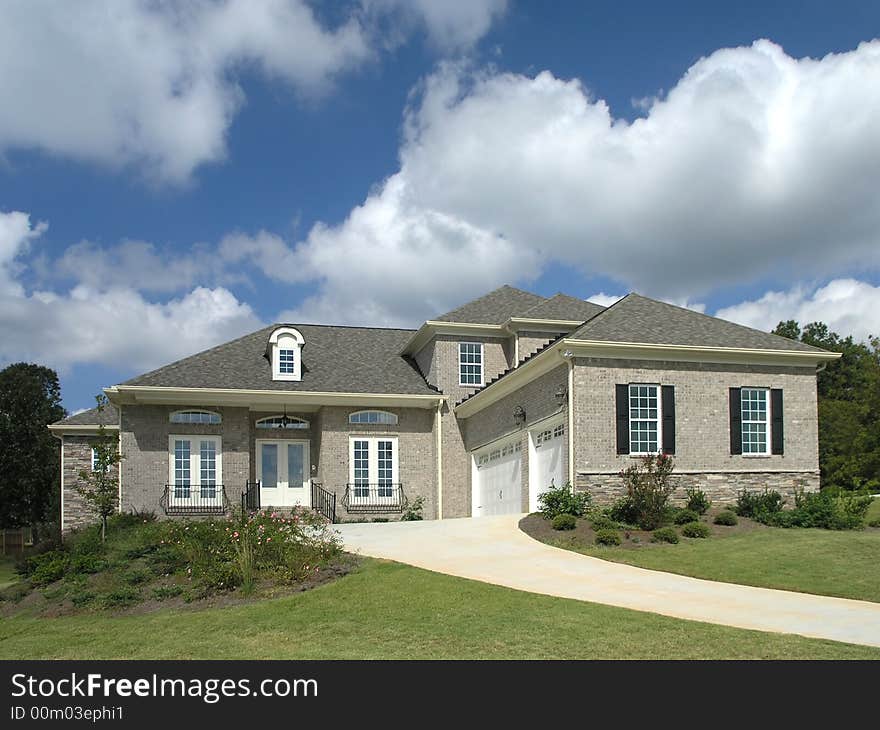 Luxury Home Exterior against blue sky. Luxury Home Exterior against blue sky