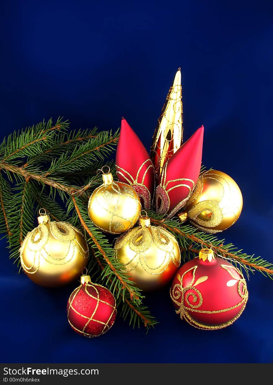 Red and yellow bulbs on Christmas tree