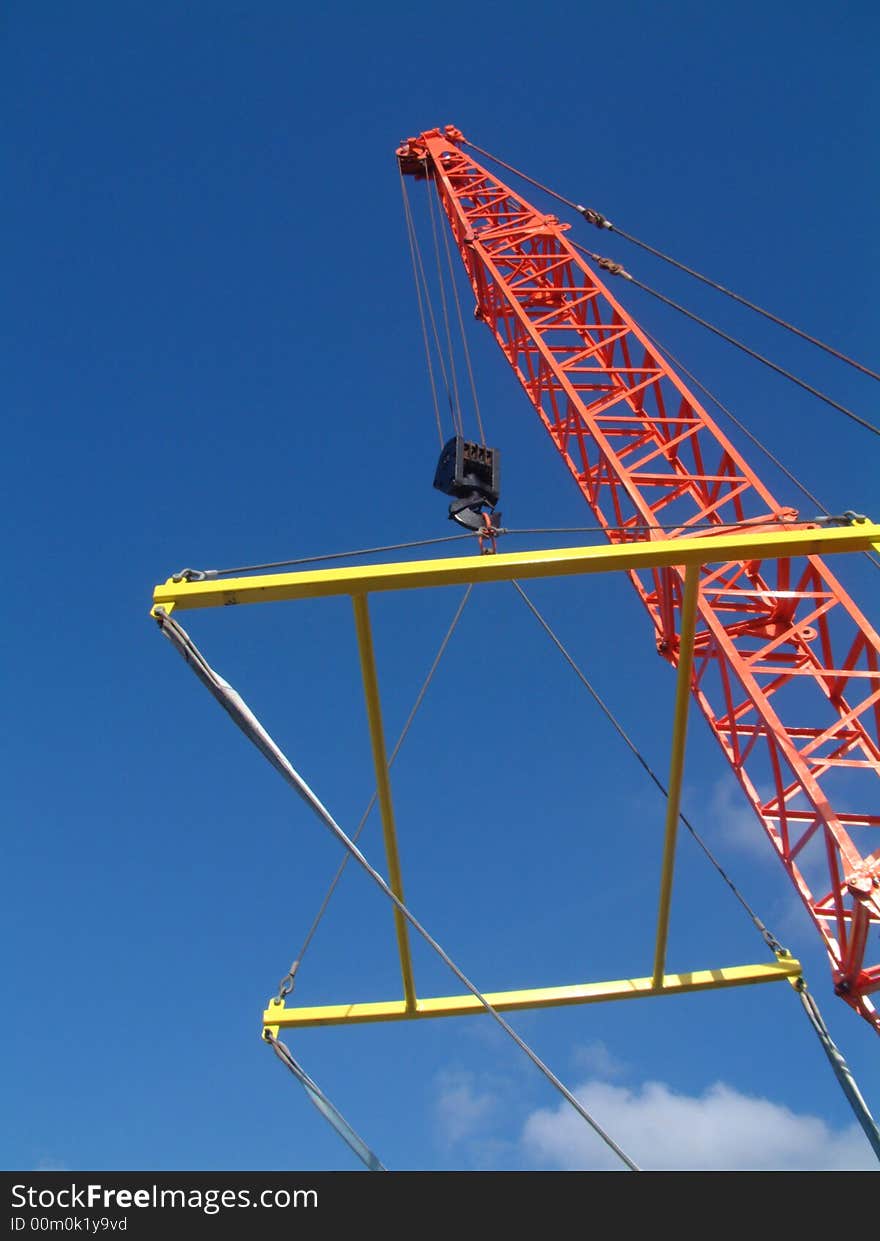 Crane at work taken from a boat yard