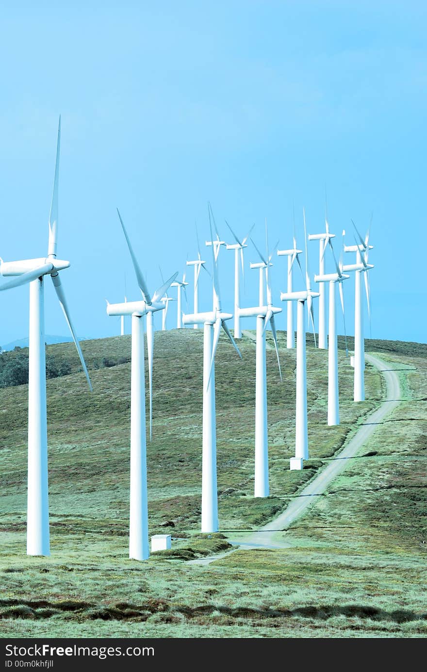 Wind turbines in a row against the sky. Wind turbines in a row against the sky