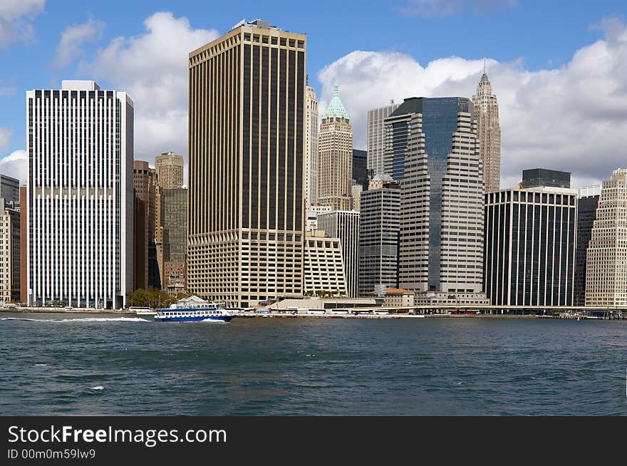 The Downtown area of Manhattan from the East River. The Downtown area of Manhattan from the East River