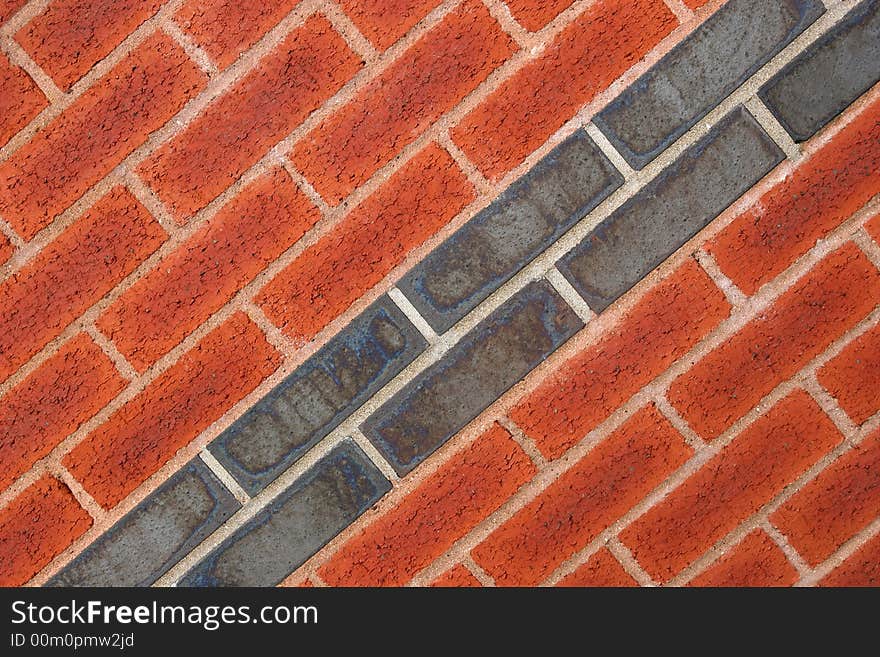 Red and dark grey bricks on a diagonal axis. Red and dark grey bricks on a diagonal axis.