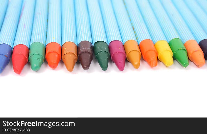 New color crayons on the white background