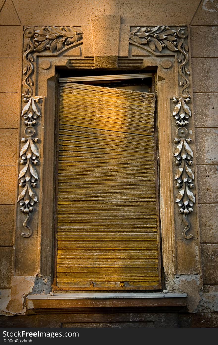 Old broken, damaged door and window on the classic building. Old broken, damaged door and window on the classic building