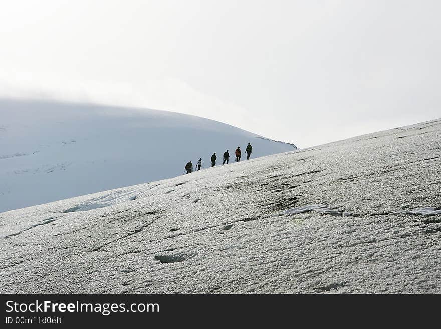 Explorers in a glacier