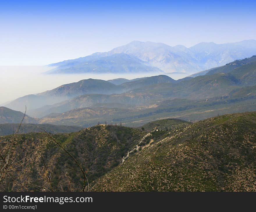 Blue sky over mountains and clouds from high mountains. Blue sky over mountains and clouds from high mountains