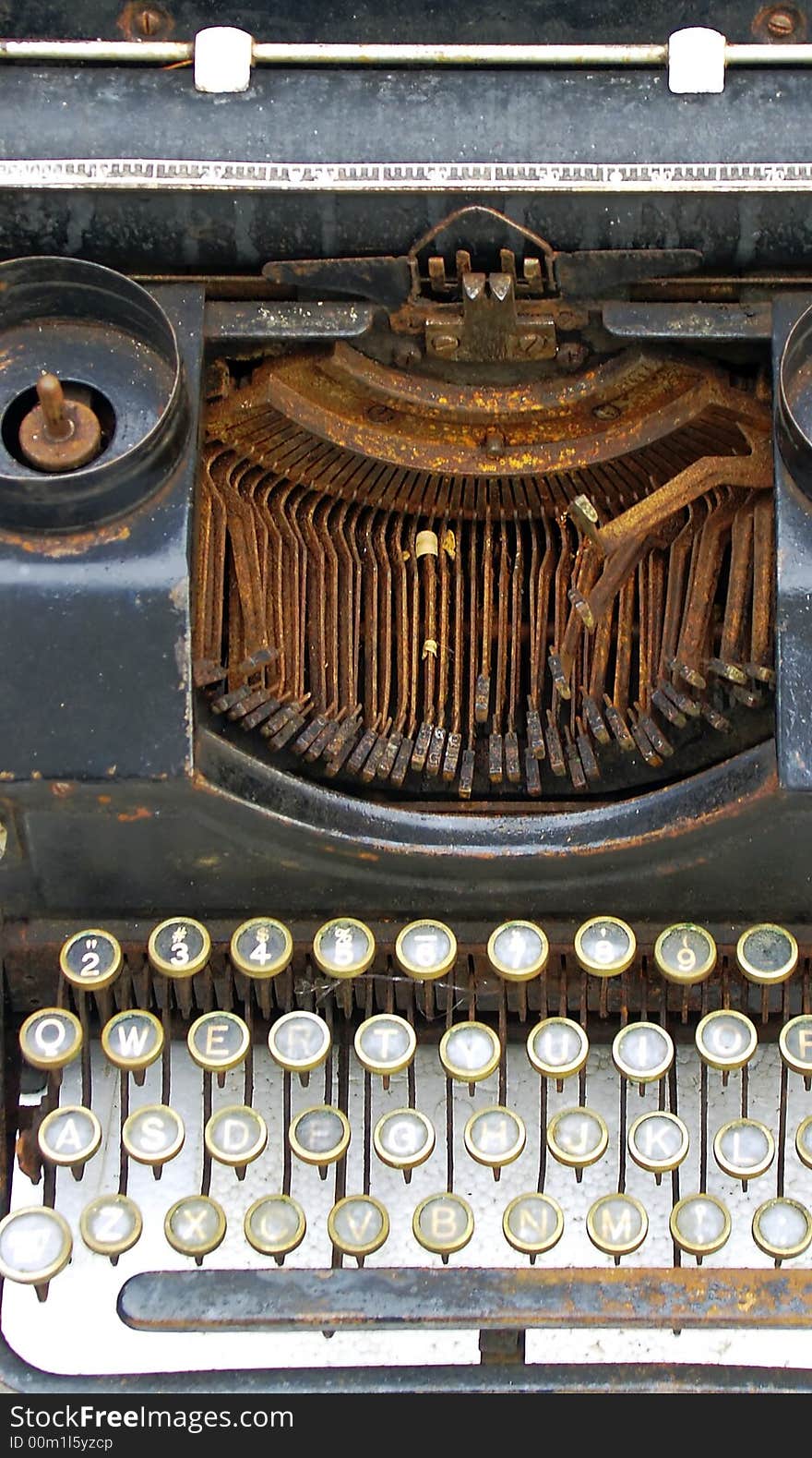 Gutted and rusty typewriter, something perhaps unknown to the modern word processing generation. Gutted and rusty typewriter, something perhaps unknown to the modern word processing generation.