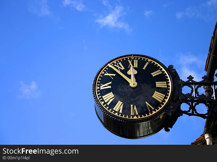 Large Public Clock Against Blu