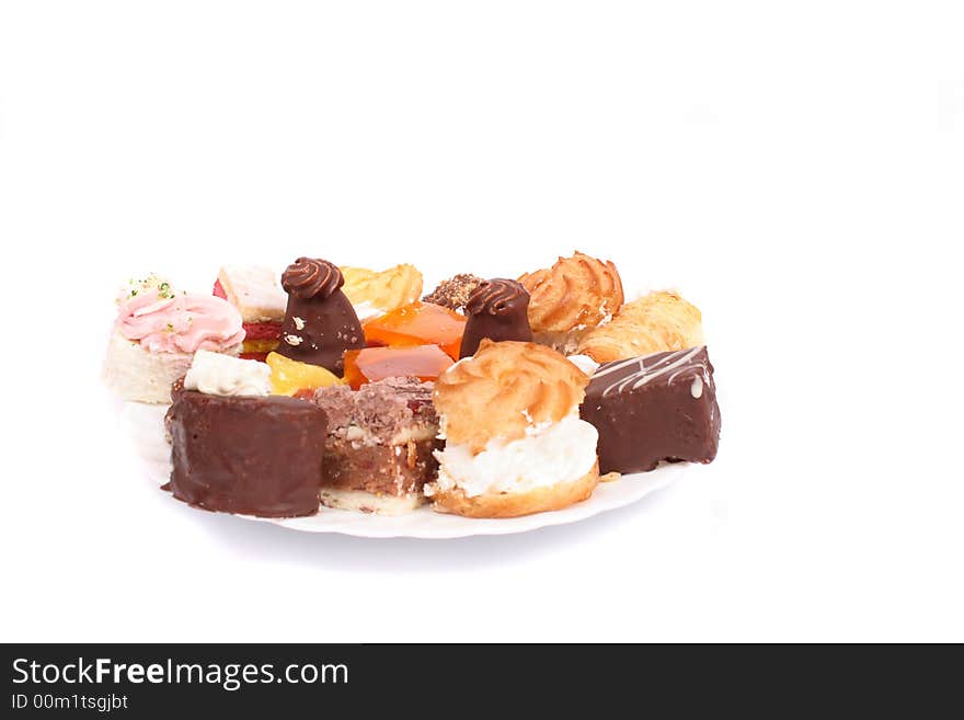 Many sweet deserts on the white background