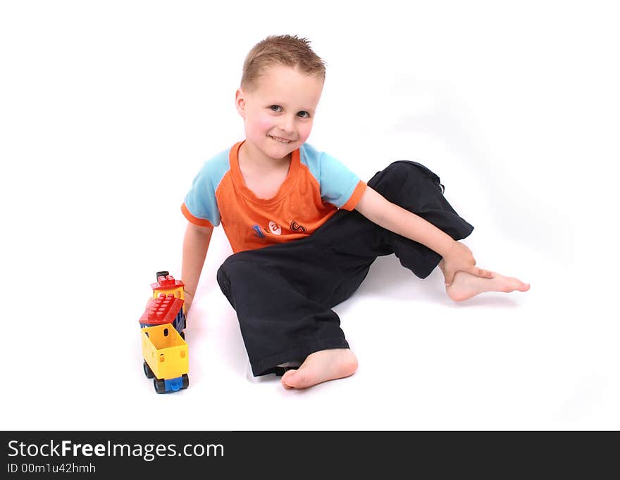 Nice young boy on the white background