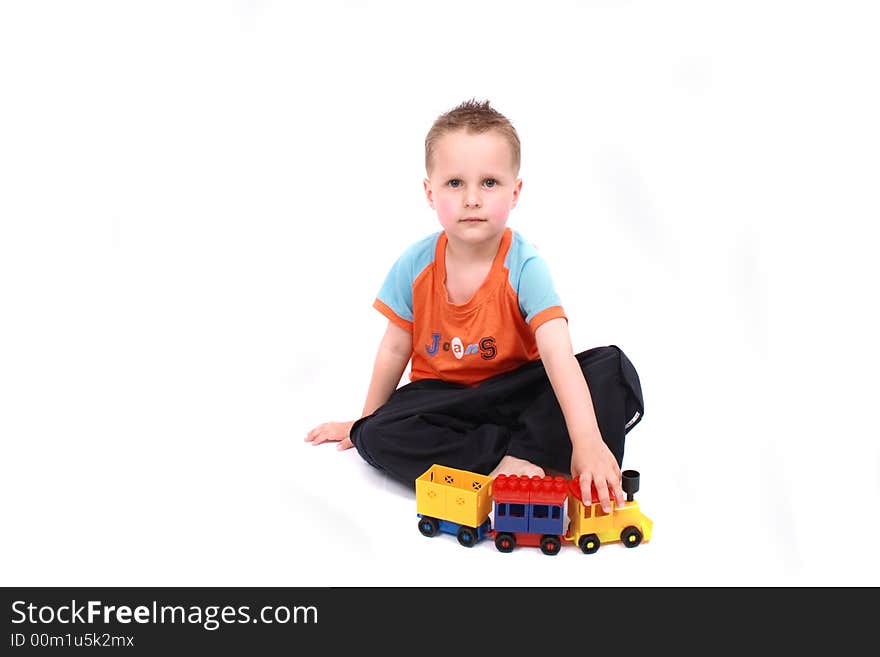 Nice young boy on the white background