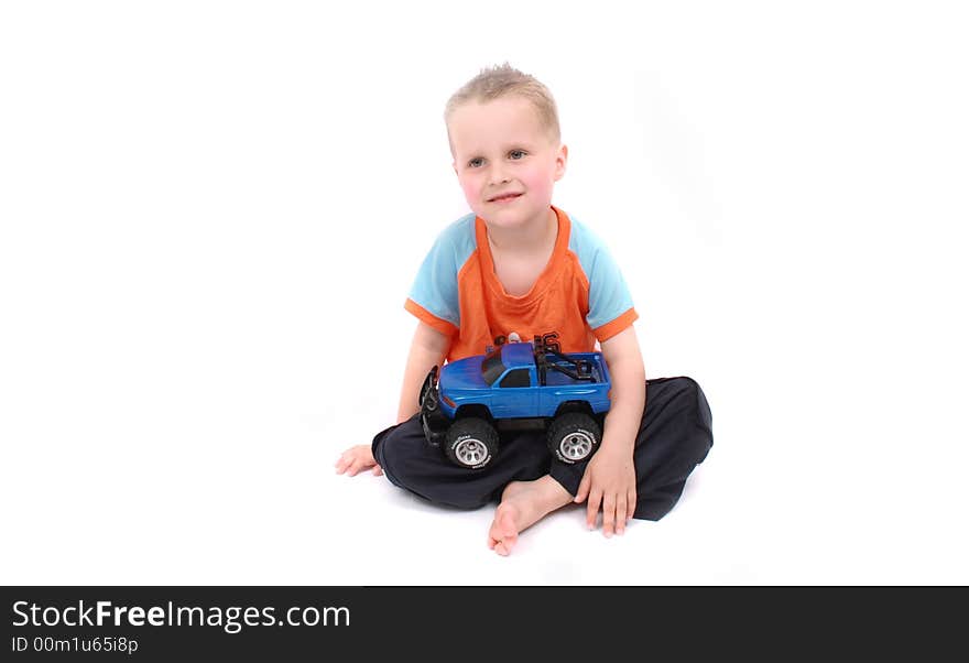 Nice young boy on the white background