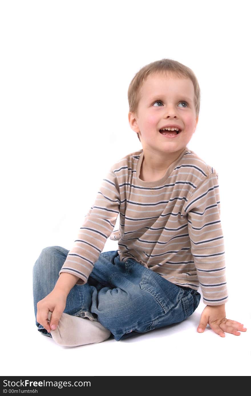 Nice young boy on the white background