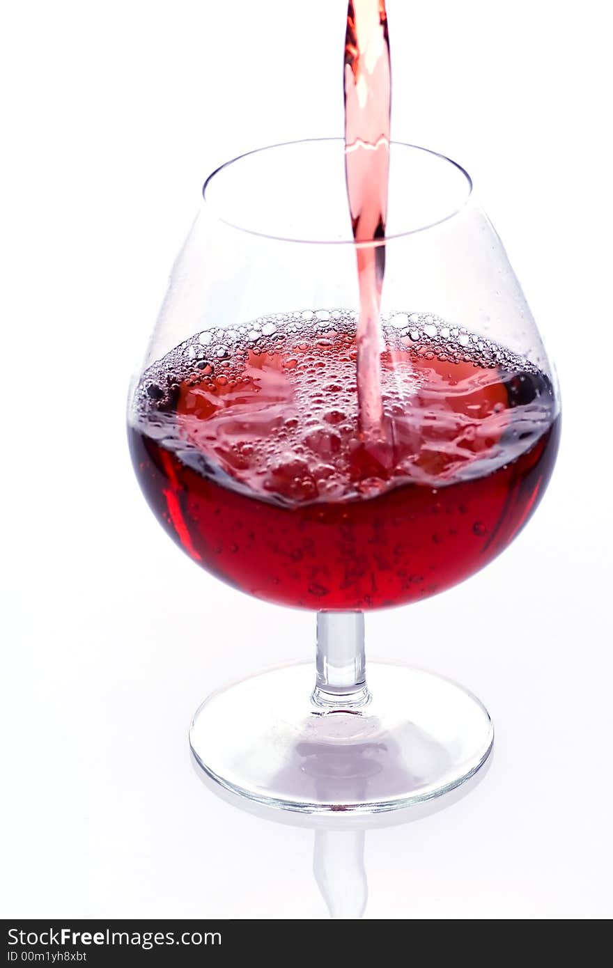 Pouring red wine into the glass - second from series