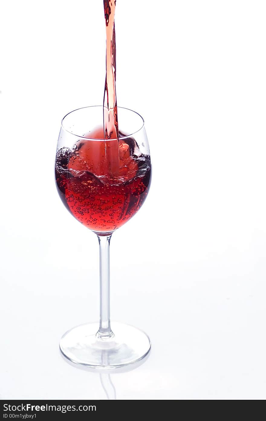 Pouring red wine into the glass - third from series