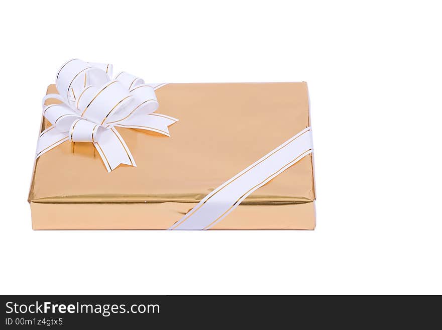 Golden present with white bow