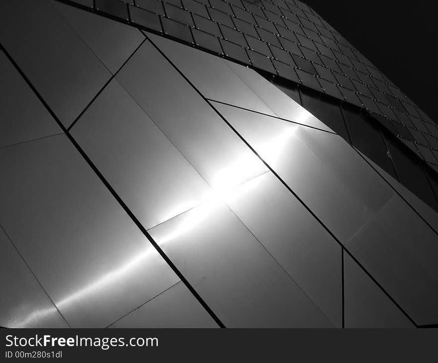 Light reflected off a modern building. Light reflected off a modern building.