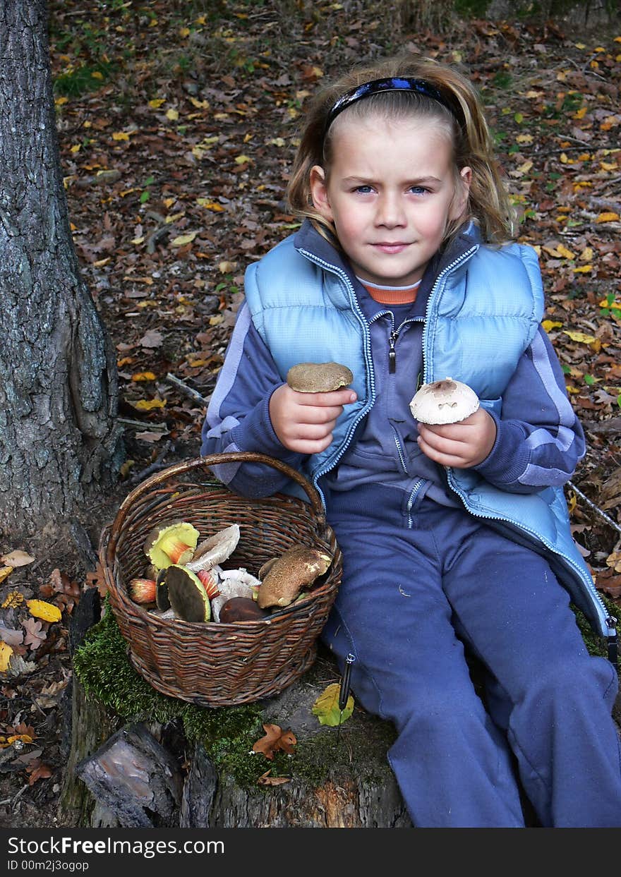 Small Boy Showing Mushrooms