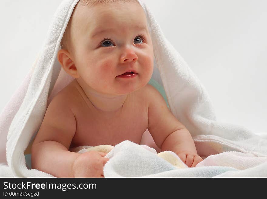 Happy 9 months girl on white background. Happy 9 months girl on white background