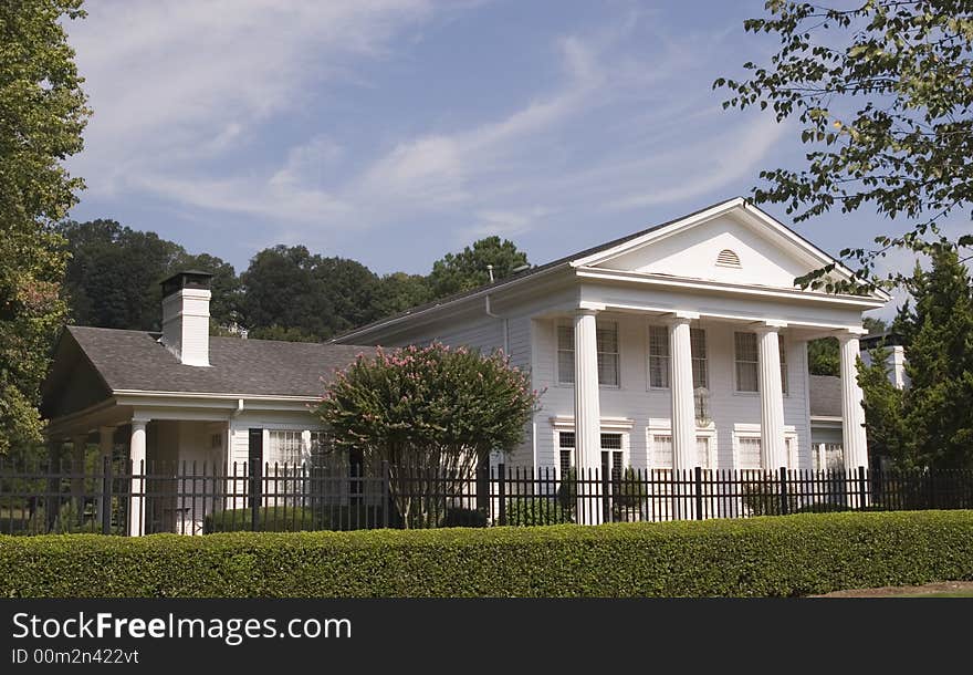 White Columns Iron Fence