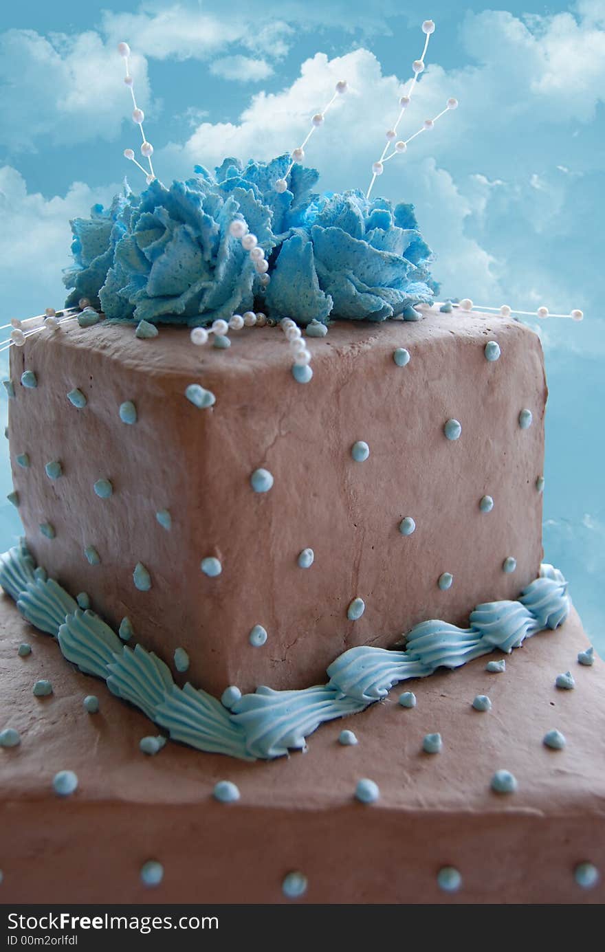 Beautiful decorated chocolate cake on a sky background. Beautiful decorated chocolate cake on a sky background.