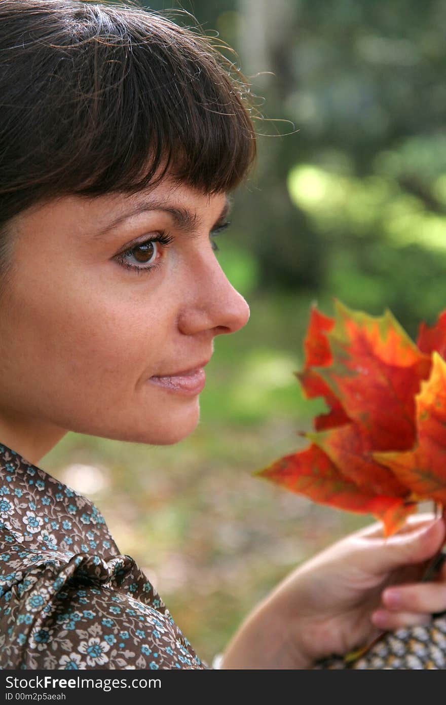 Beautiful woman walking in the autumn park. Beautiful woman walking in the autumn park