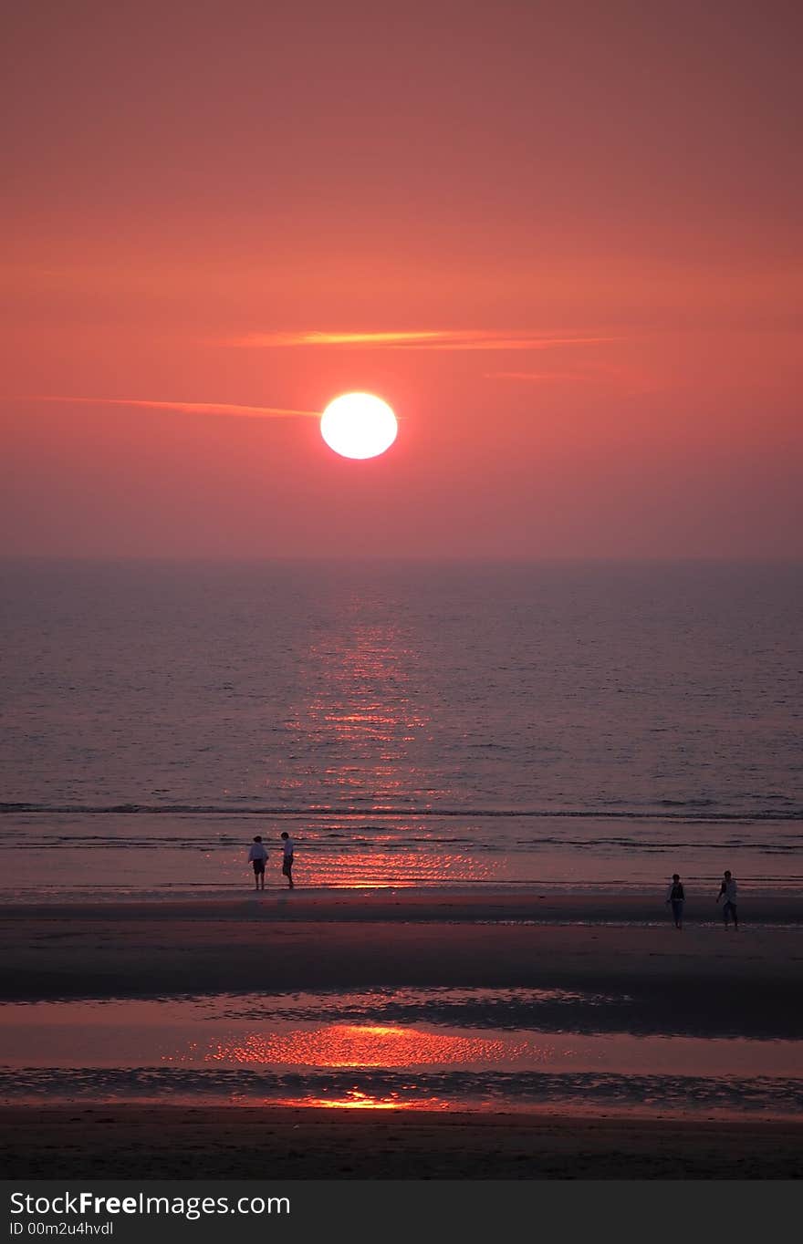 People walking on the sunset