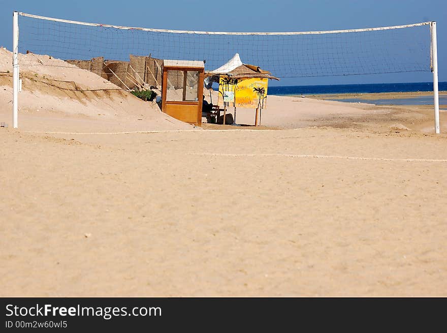 Volleyball in the summer beach.